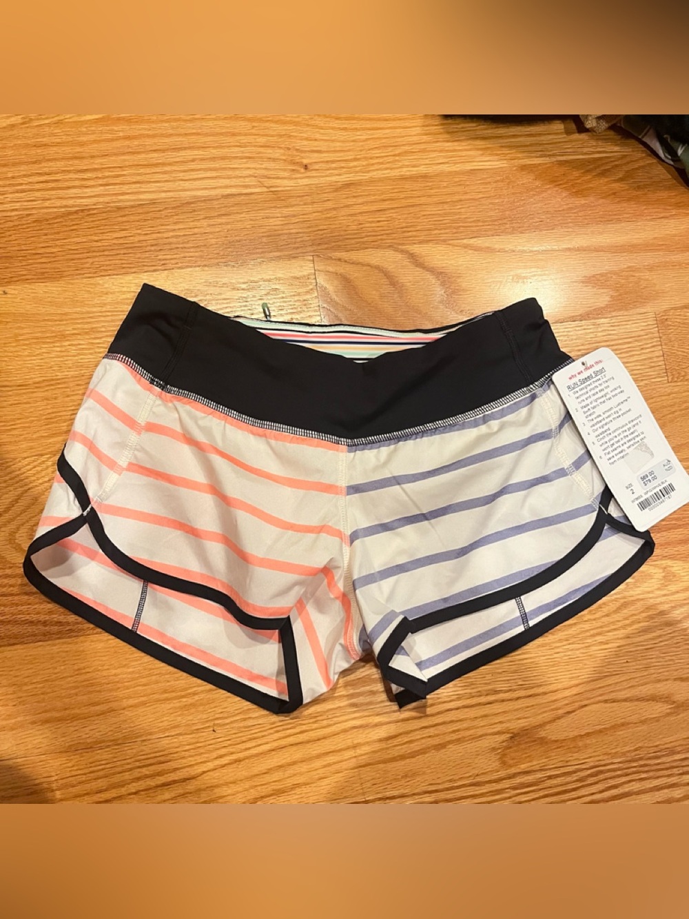 Lululemon
Performance Women’s Shorts - Black Waistband, Coral & Lavender Stripes